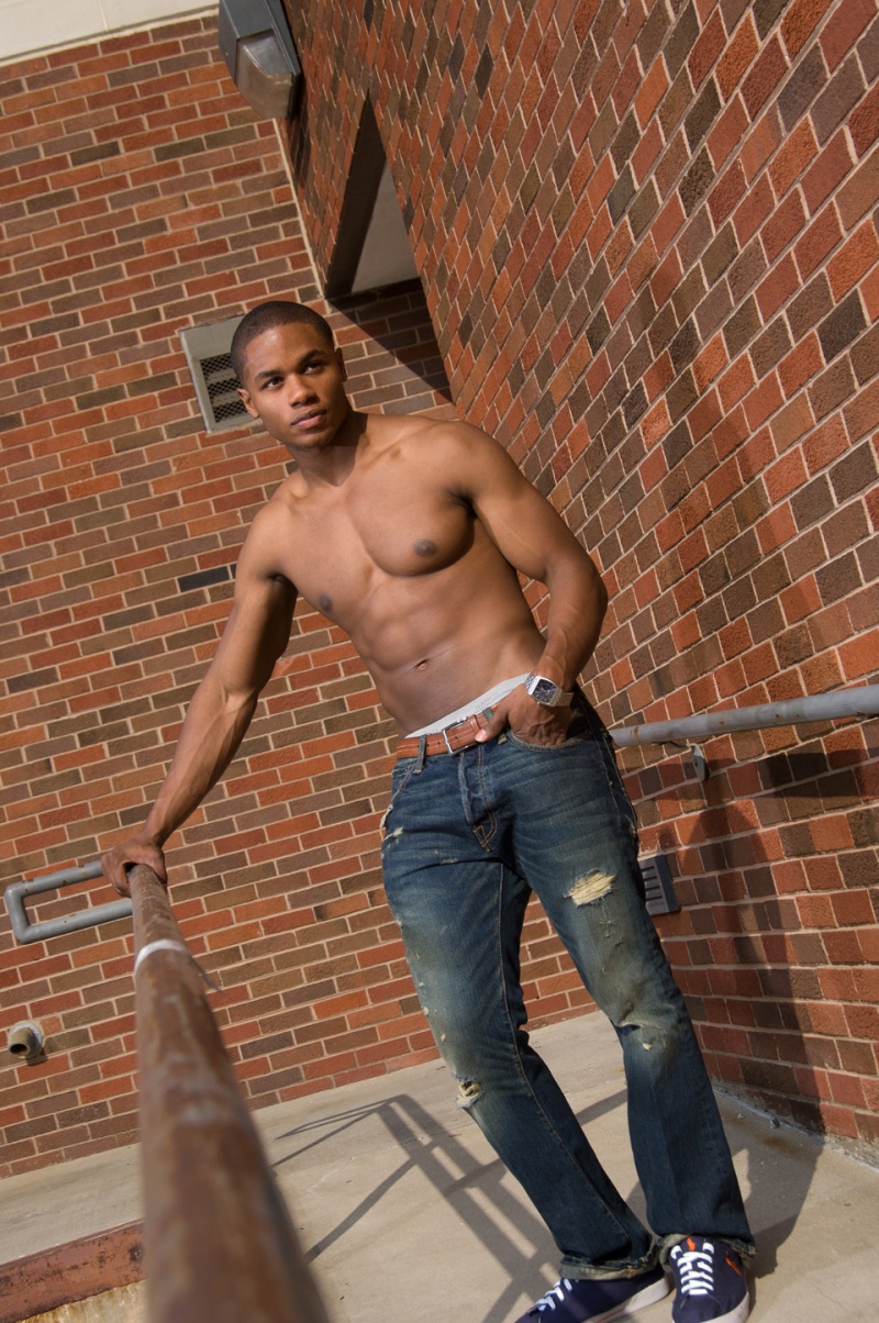 Male model photo shoot of ISAAC SAMUEL MILLER in downtown baton rouge