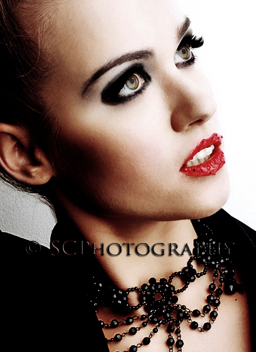 Female model photo shoot of sphinxmakeup by SCvisual, makeup by Cre8tive Make-up