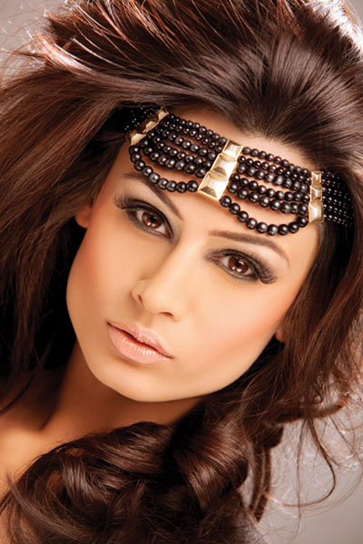 Female model photo shoot of Riana Makeup