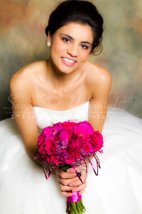 Female model photo shoot of Skevi Taliadoros in Mass Mutual Center Bridal Show