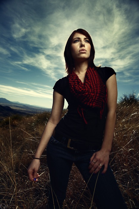 Female model photo shoot of candace celine by Garrett Meyers in up a hill near the border