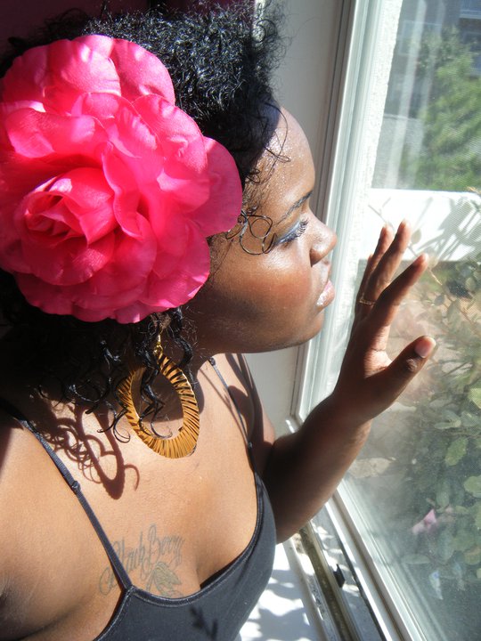 Female model photo shoot of teaona  in in my bed room window