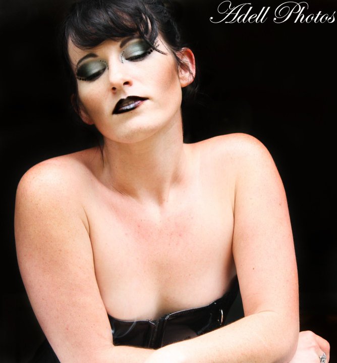 Female model photo shoot of Makeup By Adell