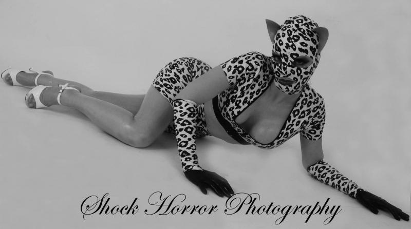 Female model photo shoot of ShockHorrorPhotography and Latex Fetish