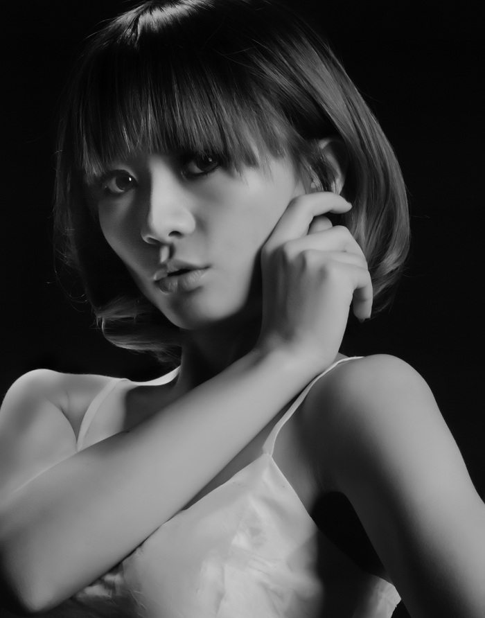 Female model photo shoot of xiao jun in Guilin, Guangxi, China