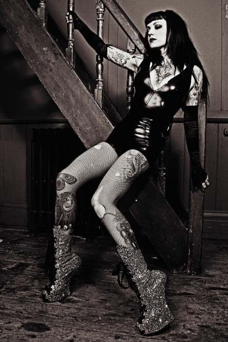 Female model photo shoot of Extacy Photographic and Nina Kate, clothing designed by Jane Doe Latex