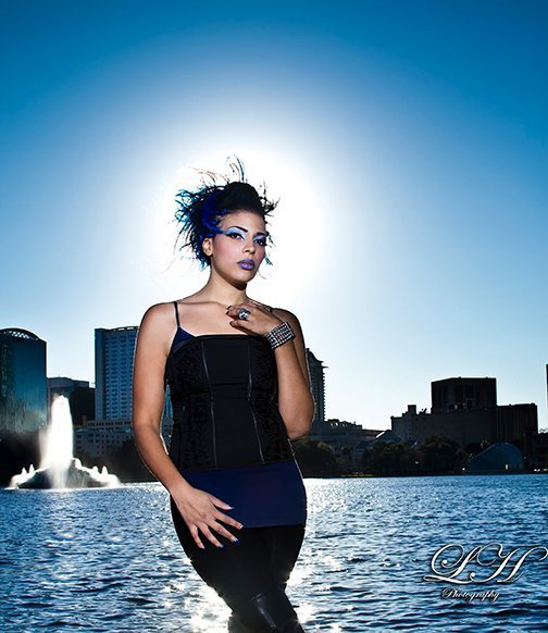 Female model photo shoot of ellease aponte by Lee Shooter Green in Lake Eola, hair styled by Shelly Westmoreland