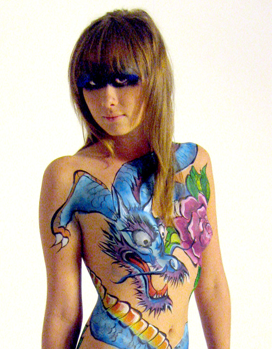Female model photo shoot of SPARK body painting in tallahassee florida