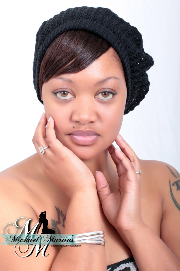 Female model photo shoot of Charma Storm by First Impression
