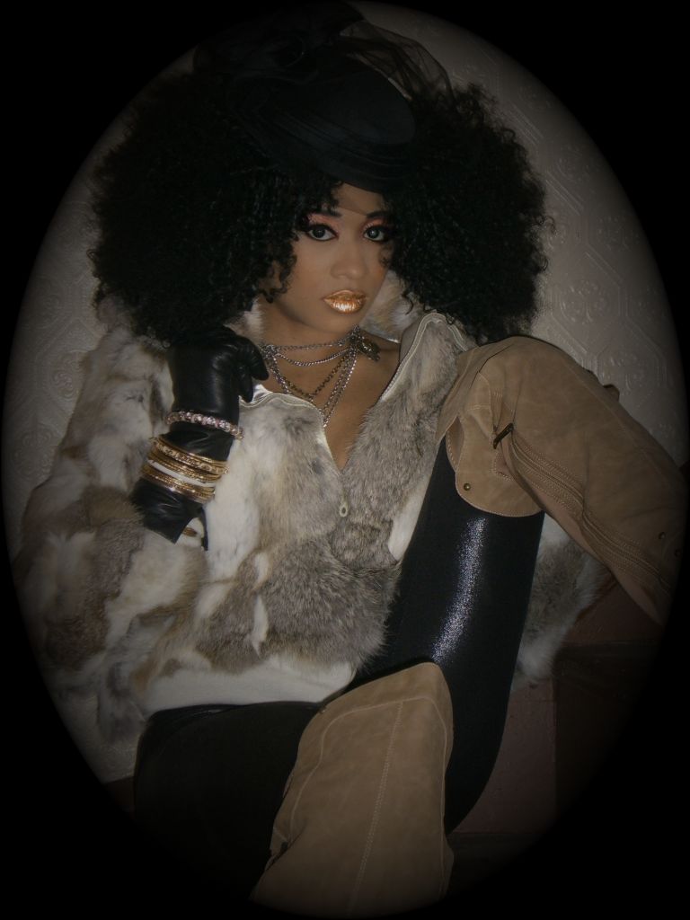 Female model photo shoot of JaMonique Hairstylist