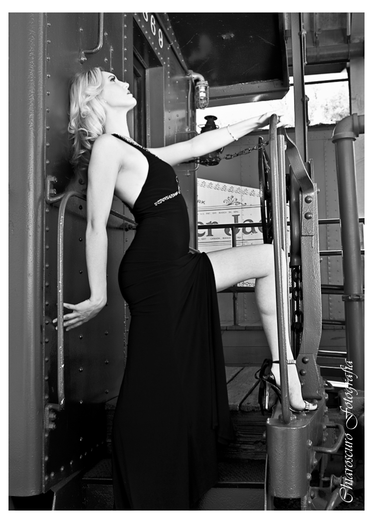 Female model photo shoot of Taylor Briana Gilfoy by Chiaroscuro Fotografia in San Juan Capistrano Train Station, makeup by Tanisha Miles