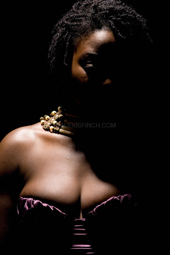 Female model photo shoot of Afie Mensah