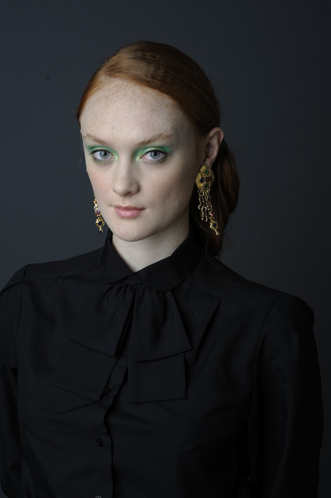 Female model photo shoot of Yellow Moth Makeup