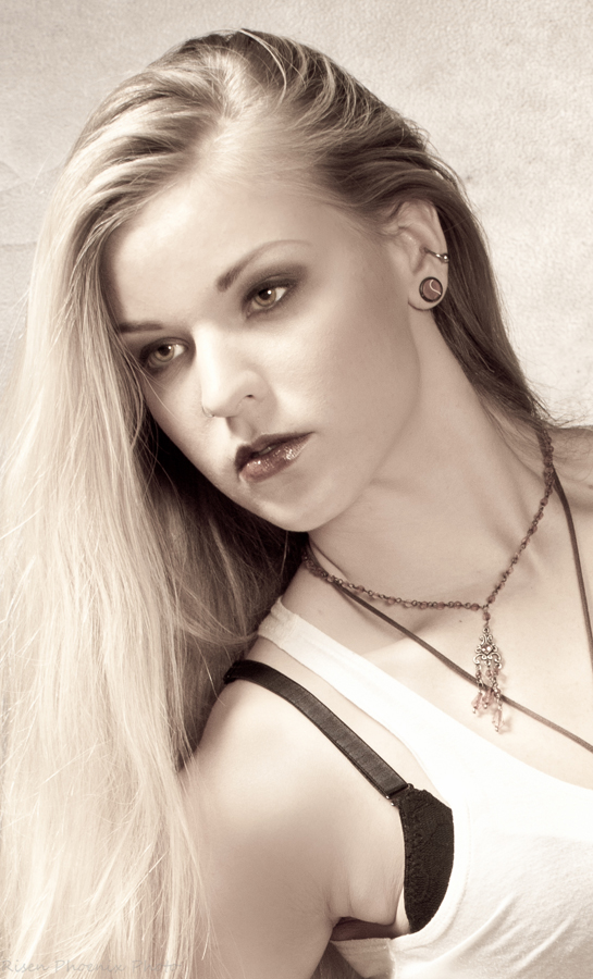Female model photo shoot of TarahMnpls by Risen Phoenix Photo, makeup by Alexa Elisabeth