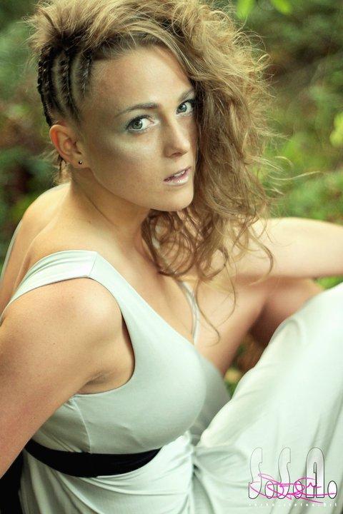 Female model photo shoot of Phoenix Rising Makeup