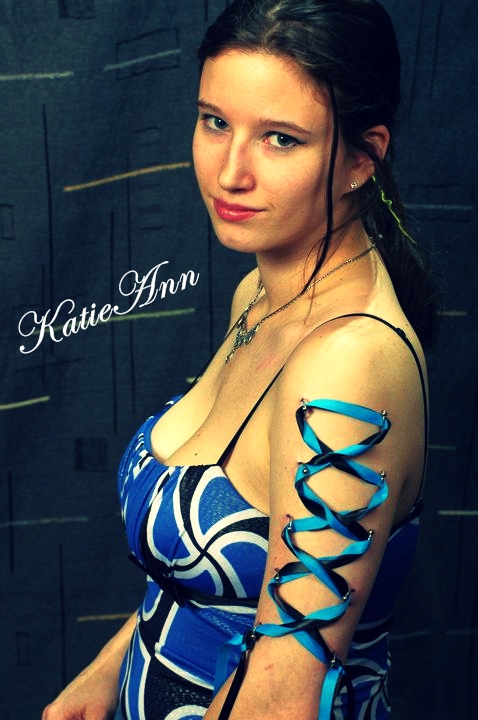 Female model photo shoot of KatieAnn by Schleuning Photography in Mystic Tattoo