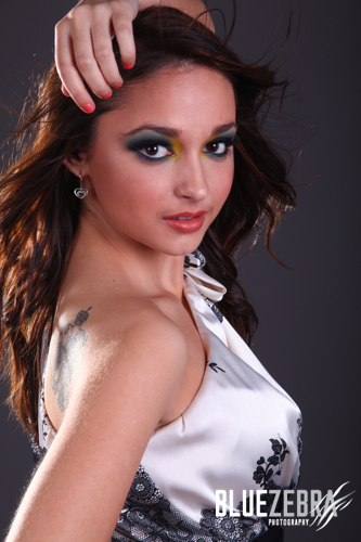 Female model photo shoot of Blue Zebra Photography in Studio, makeup by Makeup by Barbara