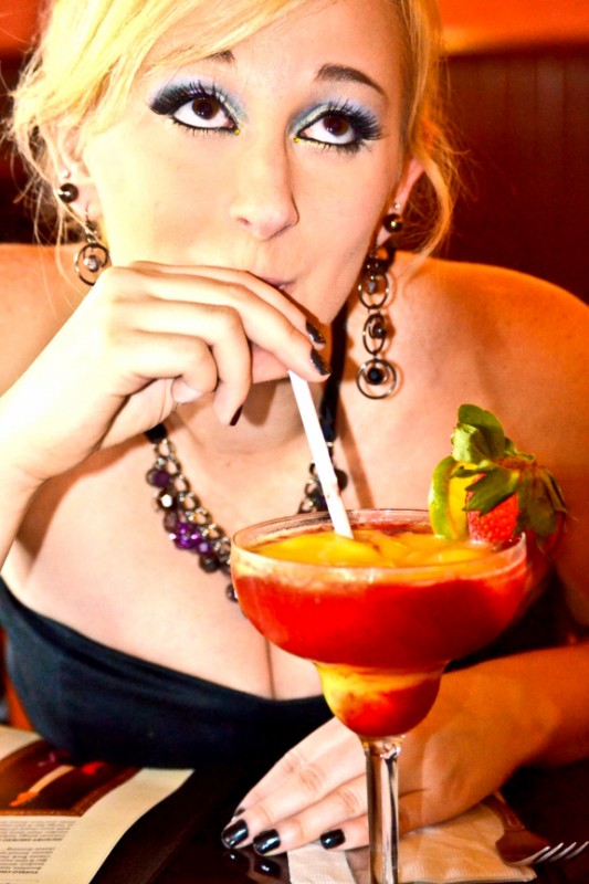 Female model photo shoot of AshleyHomerPhotography in Hard Rock Cafe New Orleans