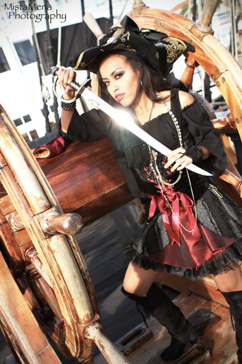 Female model photo shoot of Suzan A in HMS Surprise, San Diego, C