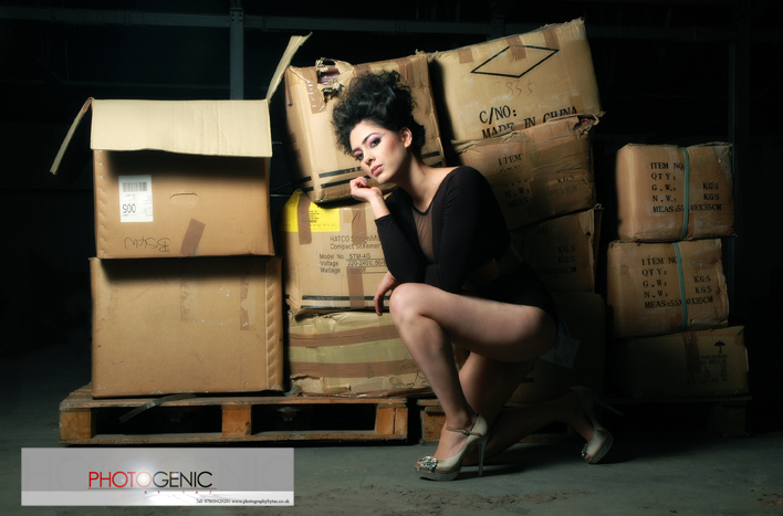 Female model photo shoot of Photogenic beauty in warehouse