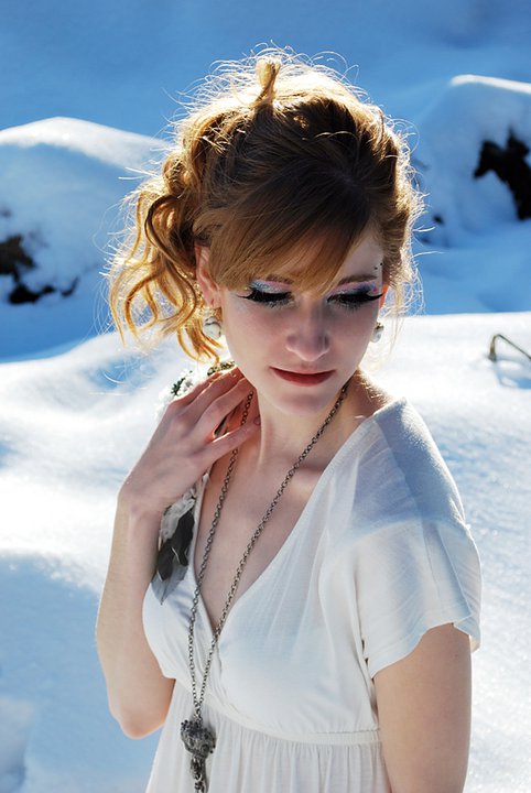 Female model photo shoot of Cher Vue in Snow