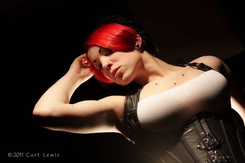 Female model photo shoot of ADRENALINE by Curt Lewis Photography in Rockford, IL