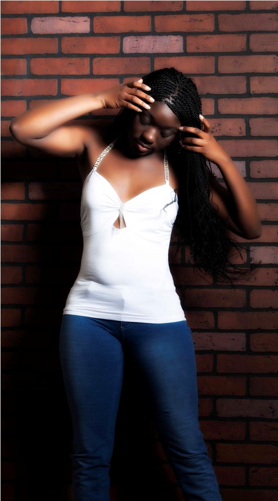 Female model photo shoot of Cocoa Brown