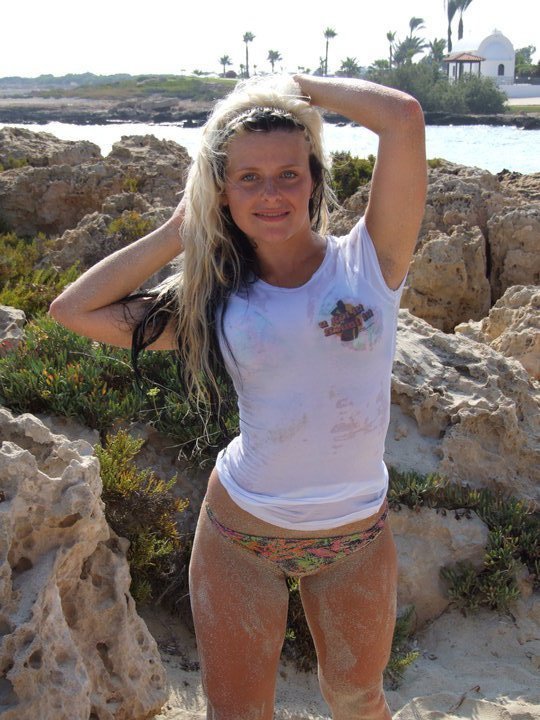 Female model photo shoot of Charlotte Louise Watson in cyprus , Nissi Beach
