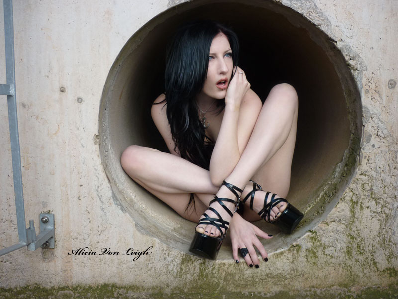 Female model photo shoot of Alicia Von-Leigh in Old water pipe