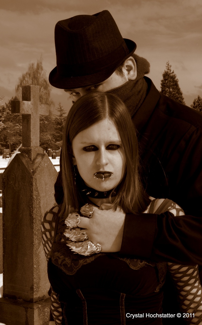 Male and Female model photo shoot of Freddy Diabolico Kruger and Lindy the Jynx by Shutterbug Revolution in Calvary Cemetary
