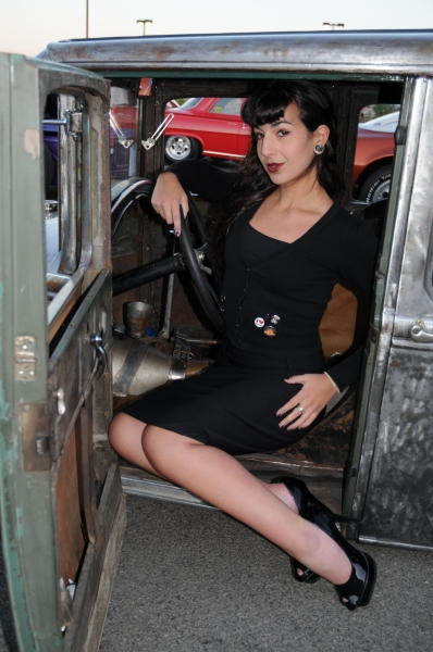 Female model photo shoot of Kim Coquette in Hot August Nights Bonanza Car Show