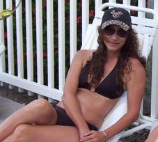 Female model photo shoot of mary teresa in beach condo