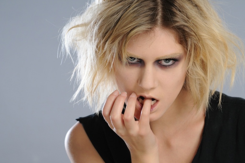 Female model photo shoot of Yellow Moth Makeup