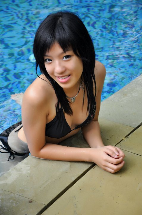 Female model photo shoot of Kawaii Patpat in Poolside