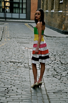Female model photo shoot of Gemma Pyemont in London back streets.