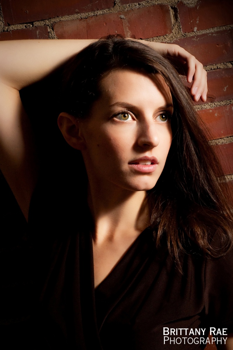 Female model photo shoot of BrittanyRae Photography in studio - studio lighting