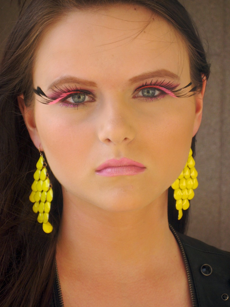 Female model photo shoot of Alluring Makeup