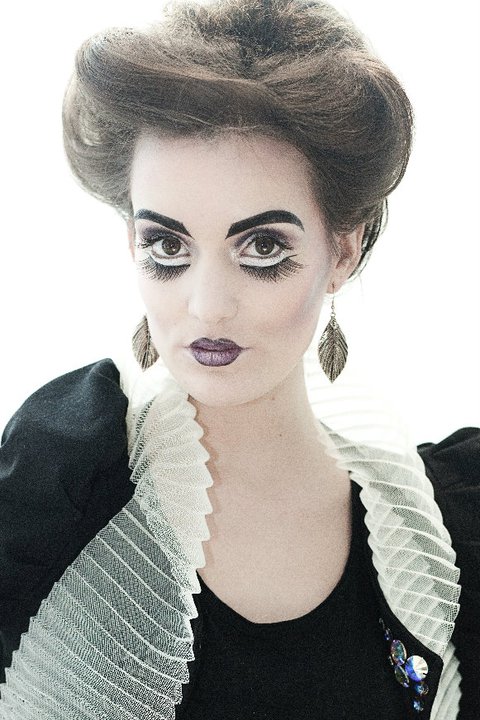 Female model photo shoot of Laura kinney Makeup