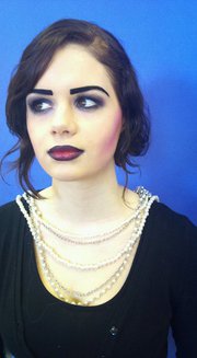 Female model photo shoot of Emma Ellis Makeup