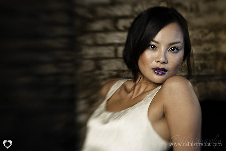 Female model photo shoot of Sandra Ng in MC Motors, East London