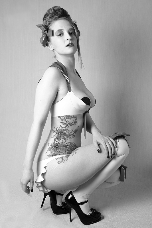 Female model photo shoot of miss_squeak by FSLUK in Flashing Skin Studio, makeup by KelzJoannidesArt MUA