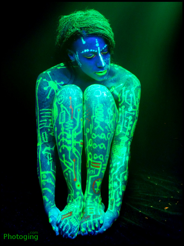 Male and Female model photo shoot of Austen Craven and Jinx LaRue in Under the warm glow of a black light