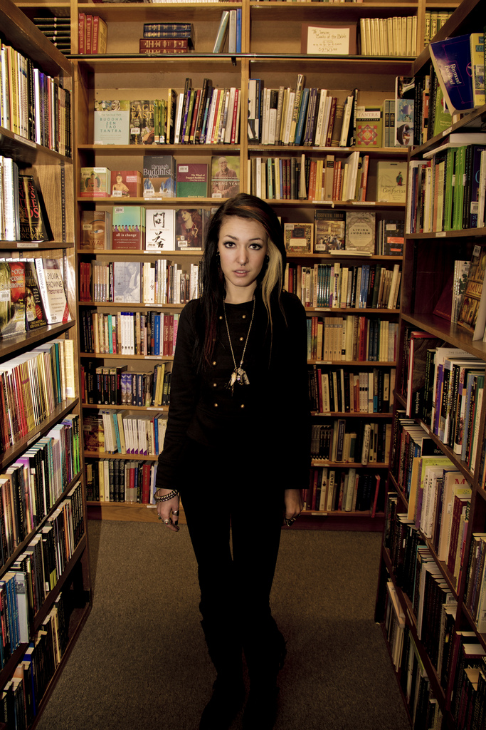 Female model photo shoot of Sarah Schell by JaredThomas Photography in Uptown Bookstore