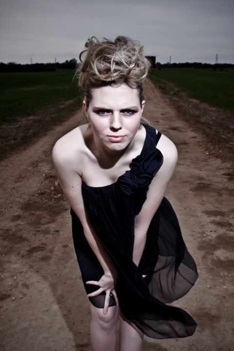 Female model photo shoot of Nicola E in farm road