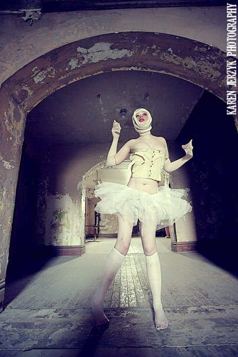 Female model photo shoot of Ann Disaster by karenjerzykphotography in Ohio State Reformatory., makeup by Artifex 