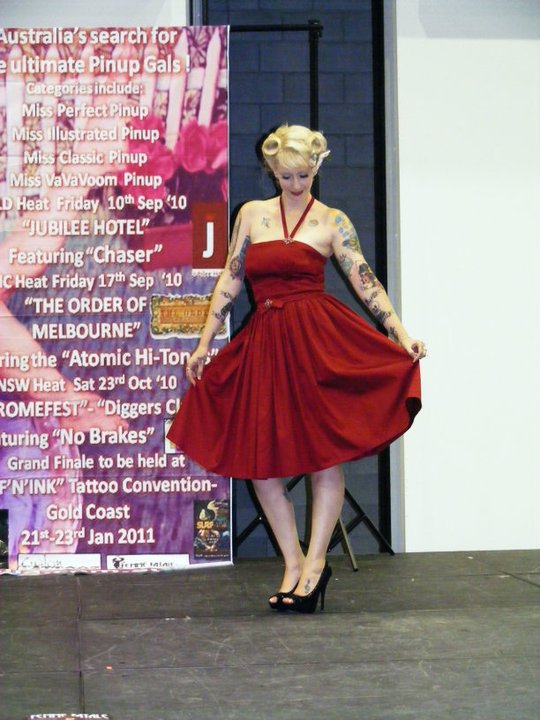 Female model photo shoot of Miss Katie Cupcake in Surf 'n Ink Tattoo Convention 2011