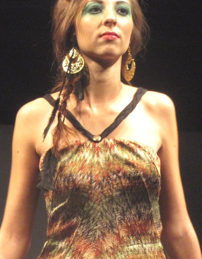 Female model photo shoot of MalloryyB in New Orleans Fashion Week 2011