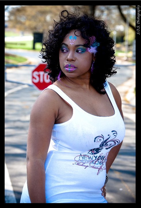Female model photo shoot of NY Reflections in Greensboro, NC  Hair and Beauty Expo 2011