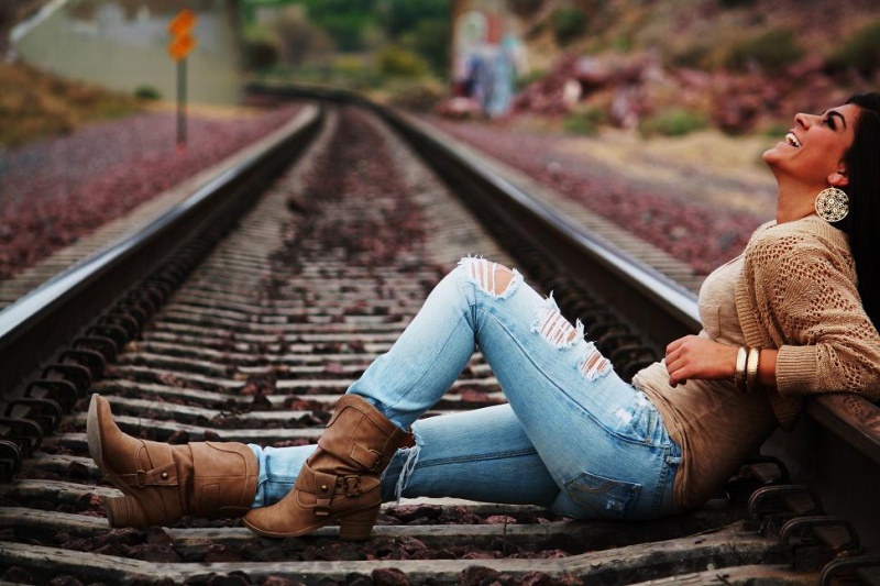 Female model photo shoot of TessaLynn by Brittany Ann_Beeritt in Railroad tracks