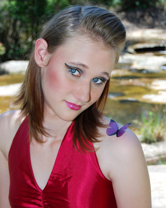 Female model photo shoot of Stardust Make-up